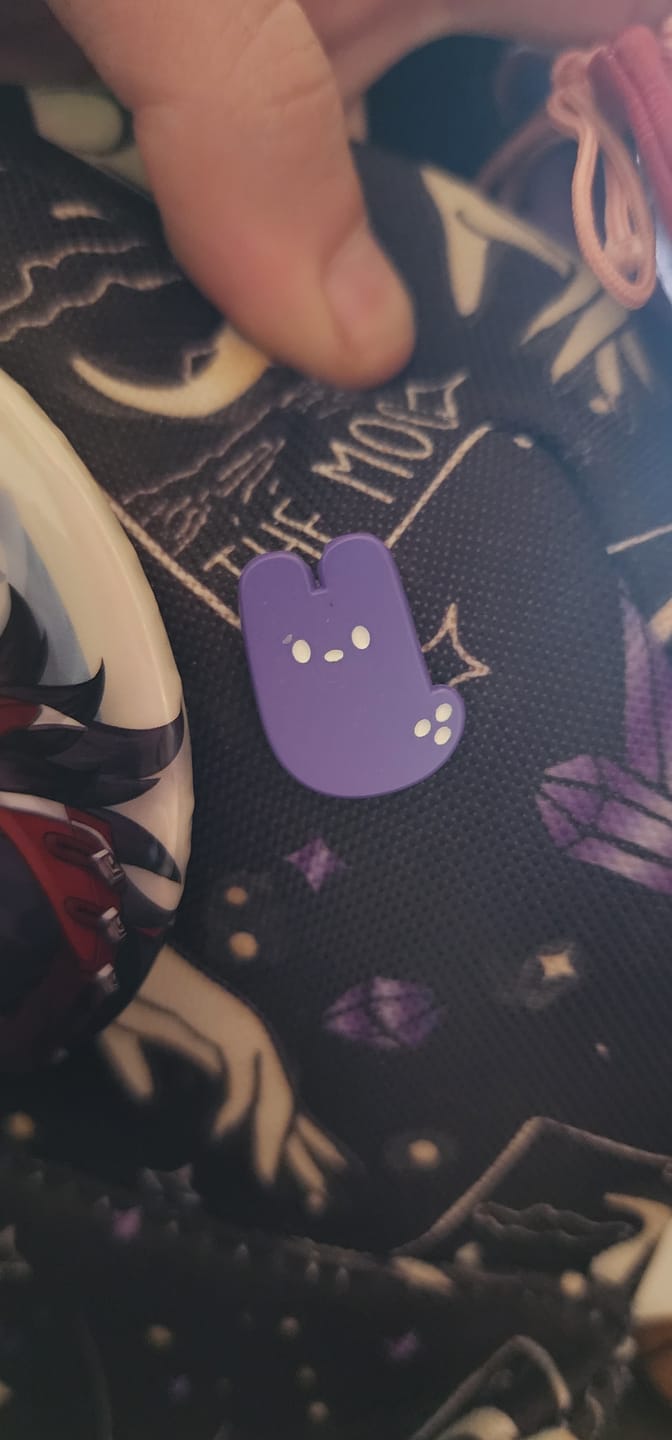 Customer photo review of Rain World - Spearmaster Slugcat Marshmallow Mini Pin