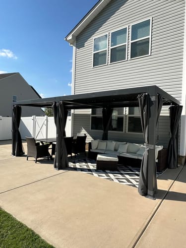 Customer photo review of HOMREST Louvered Pergola 10x20 Outdoor Hard Top Pergola with Aluminum Frame and Adjustable Metal Rainproof Roof for Garden & Patio, Curtains and Netting Included, Gray-Black