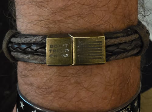 Customer photo review of Don't Tread On Me Leather Bracelet: Helps Pair Veterans With A Service Dog or Shelter Dog