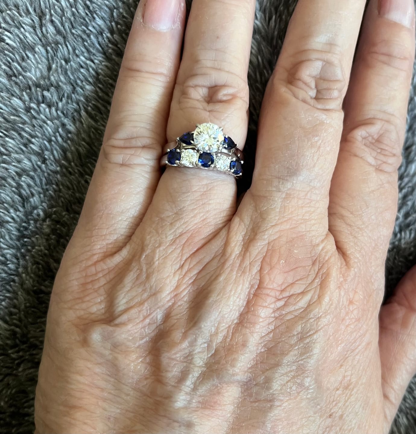Customer photo review of Five Stone Moissanite and Sapphire Wedding Band Ring In Sterling Silver