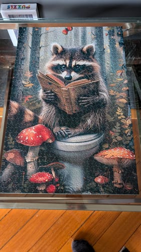 Customer photo review of Studious Raccoon 500 / 1000 Piece Puzzle