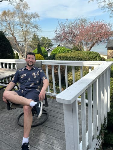 Customer photo review of Men's Floral Printed Button Up Casual Short Sleeve Shirt