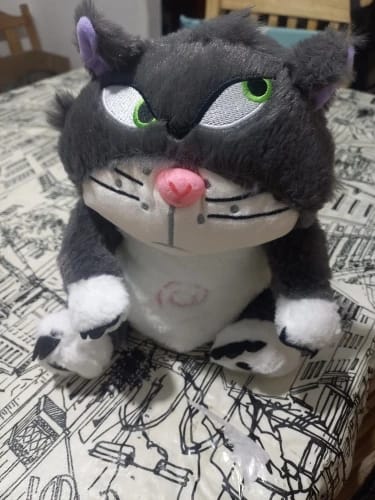 Customer photo review of Leering Cat Breathing Musical Plush Toy