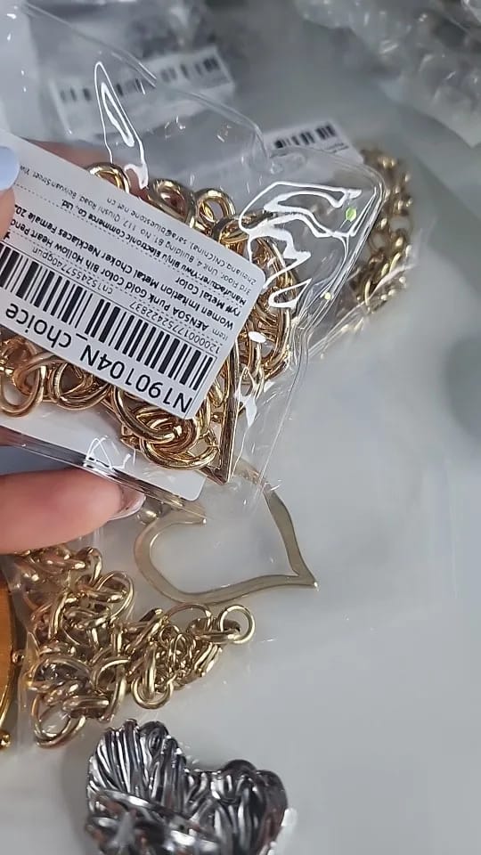 Customer photo review of Stainless Steel Necklace Hollow Heart Pendant — Gold | KIMLUD