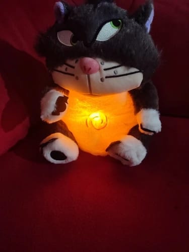 Customer photo review of Leering Cat Breathing Musical Plush Toy