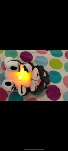 Customer photo review of Leering Cat Breathing Musical Plush Toy