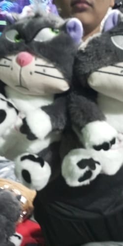 Customer photo review of Leering Cat Breathing Musical Plush Toy
