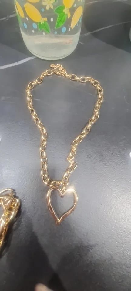 Customer photo review of Stainless Steel Necklace Hollow Heart Pendant — Gold | KIMLUD