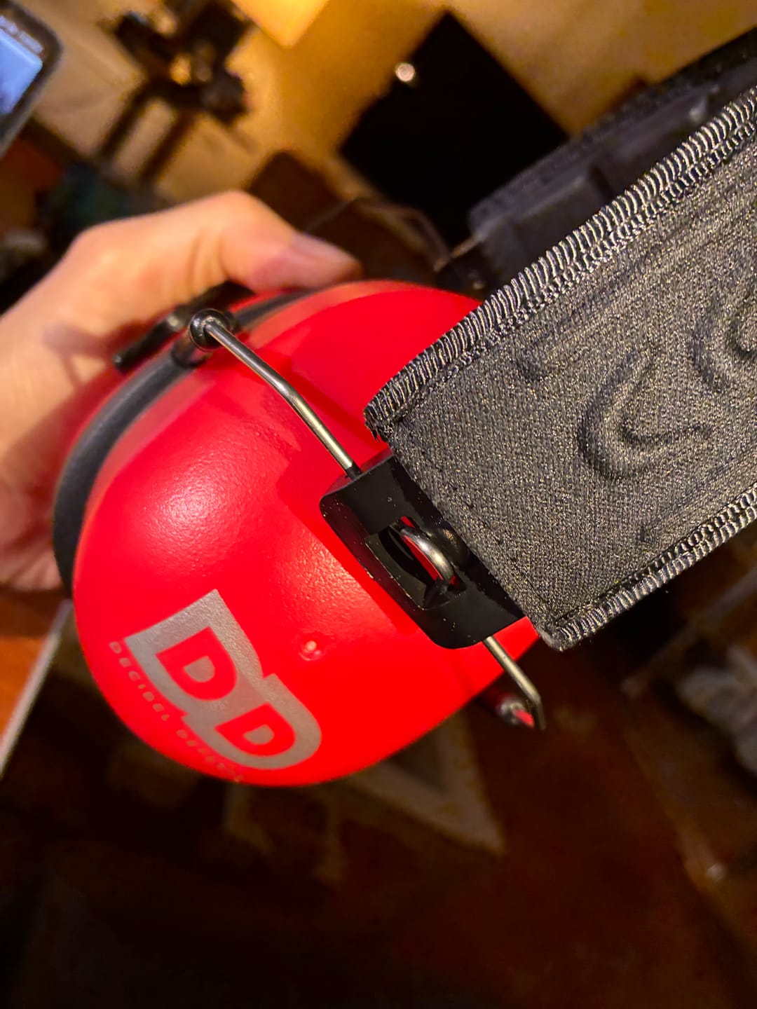 Customer photo review of Decibel Defense Safety Earmuffs in Red