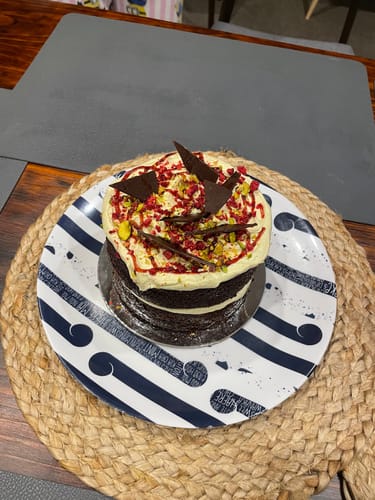 Customer photo review of Chocolate & Pistachio Cake