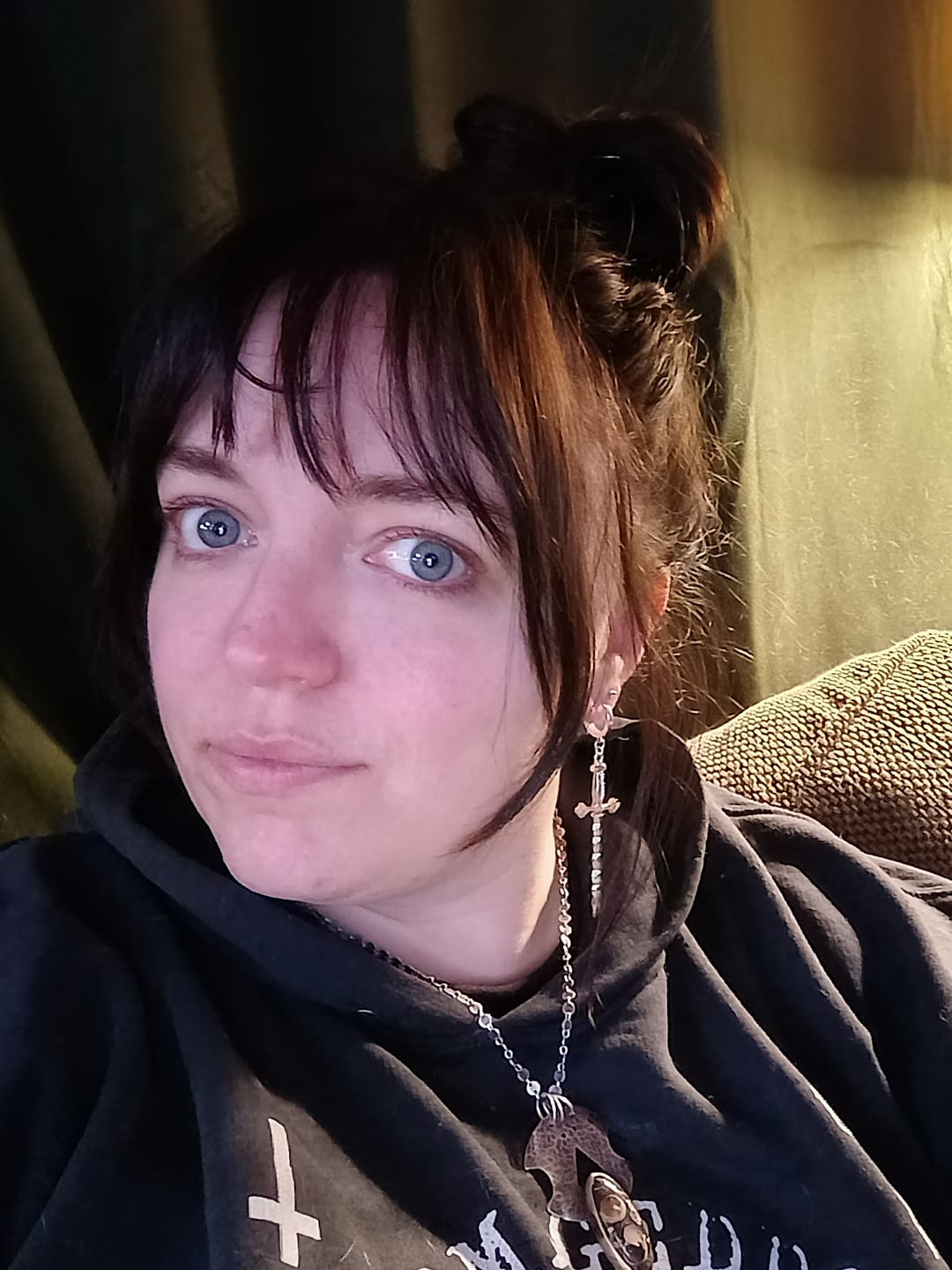 Customer photo review of Wavy Sword Earrings