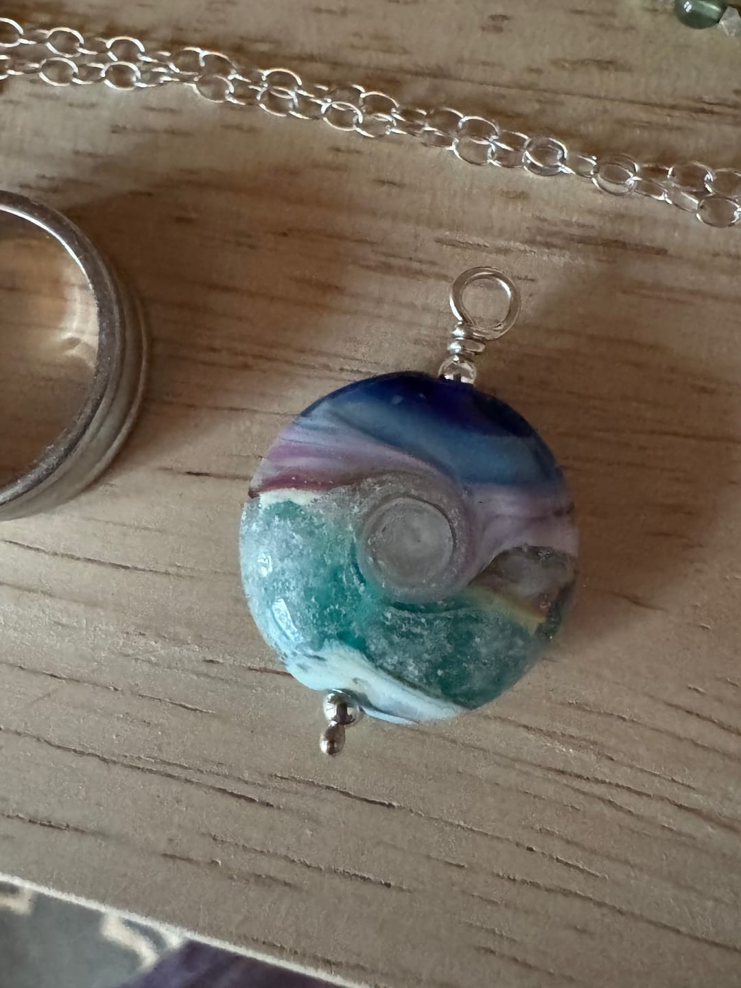 Customer photo review of Ocean Wave Sunset Pendant with Cremation Ash
