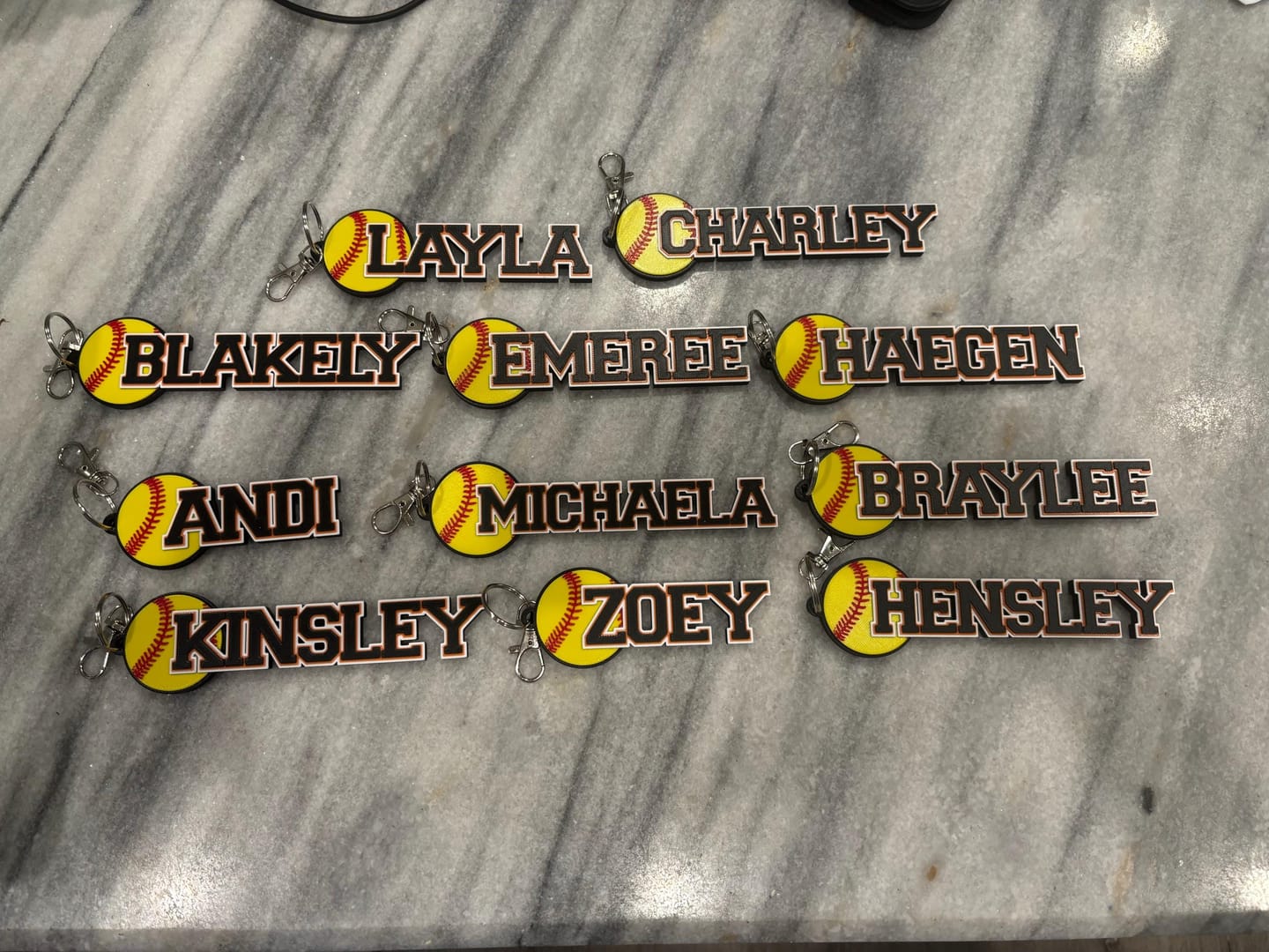 Customer photo review of Personalized Softball Bag Tag | Team Gift & Player Bundle