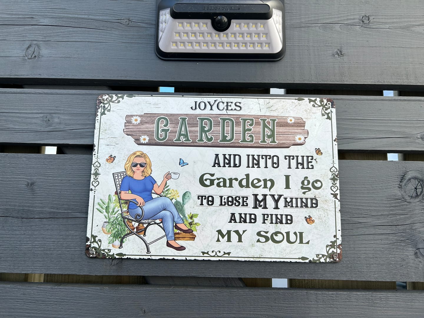 Customer photo review of And Into The Garden I Go Gardening Girl - Garden Sign - Personalized Custom Classic Metal Signs - Gift For Gardeners
