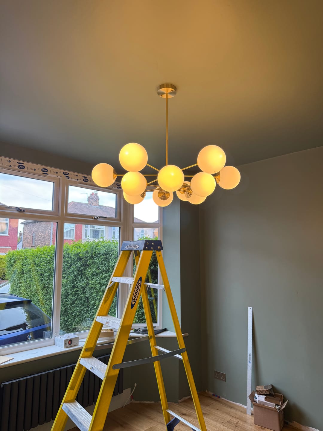 Customer photo review of 12-Light Two-tier Sputnik Opal Globe Chandelier