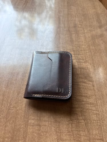 Customer photo of minimalist badge wallet