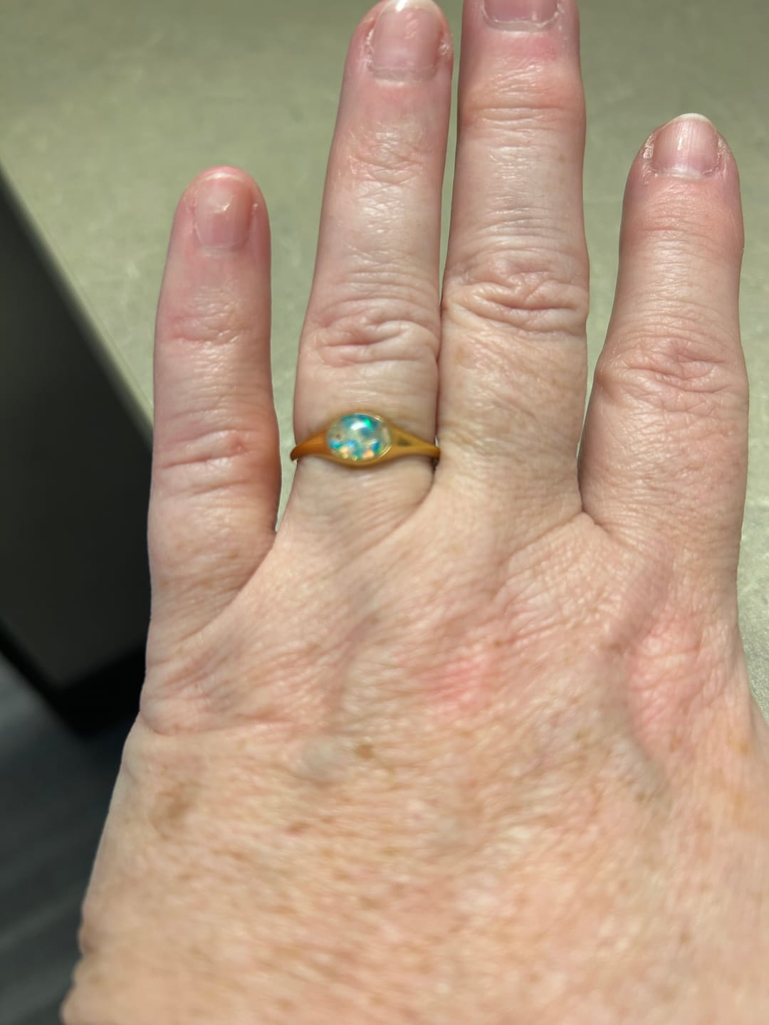 Customer photo review of Golden Oval Ring with Cremation Ashes