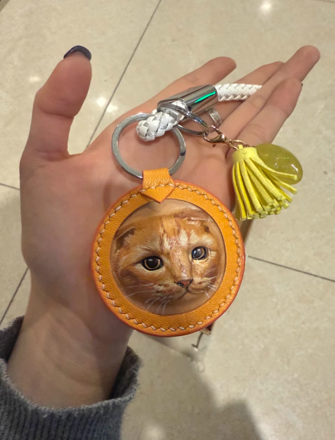 Customer photo review of Custom Handcrafted Leather Pet Portrait Charm