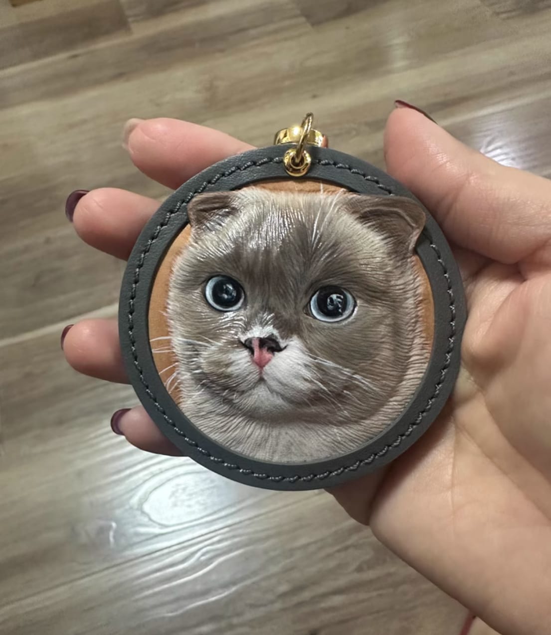 Customer photo review of Custom Handcrafted Leather Pet Portrait Charm