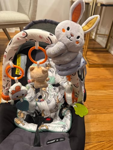 Customer photo review of 2-in-1 Spiral Activity Toy and Arch for Stroller, Car Seat & Crib