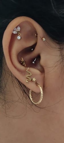 Customer photo review of Piercing Lotus Flower Colgante Titanio