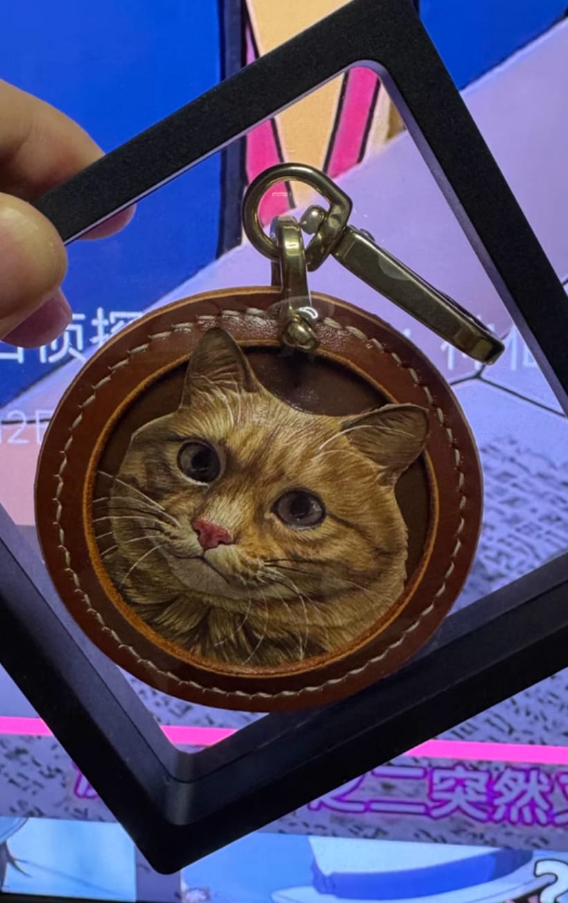 Customer photo review of Custom Handcrafted Leather Pet Portrait Charm
