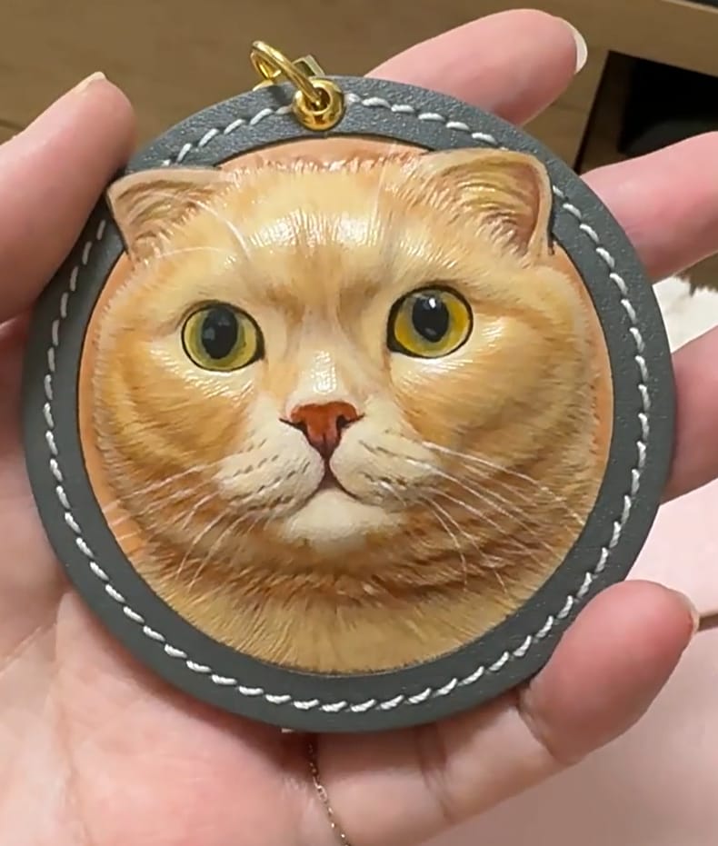 Customer photo review of Custom Handcrafted Leather Pet Portrait Charm