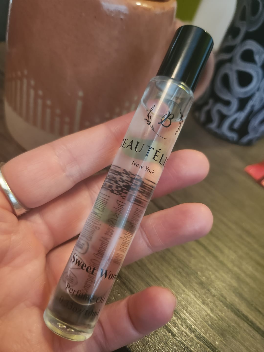 Customer photo review of Sweet Wood Perfume Oil