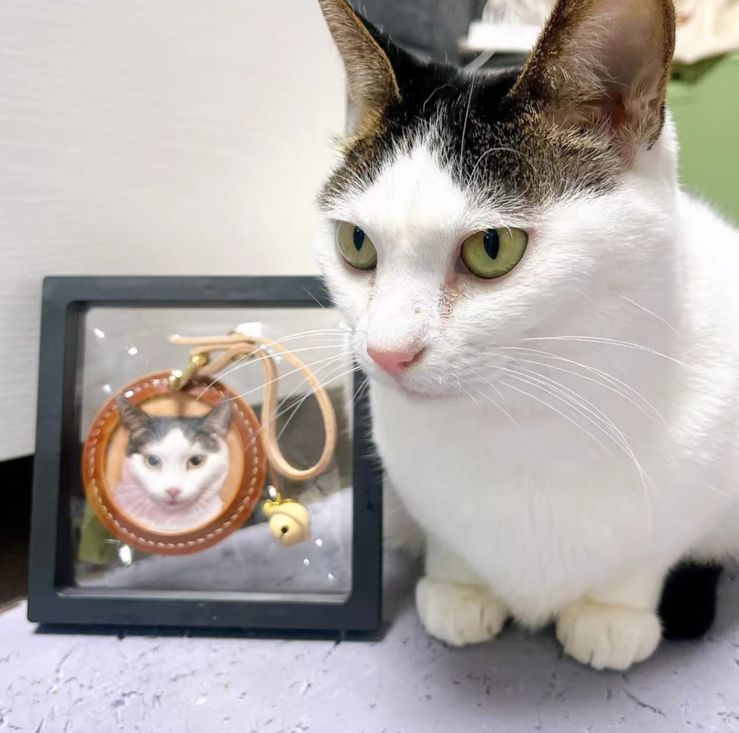 Customer photo review of Custom Handcrafted Leather Pet Portrait Charm