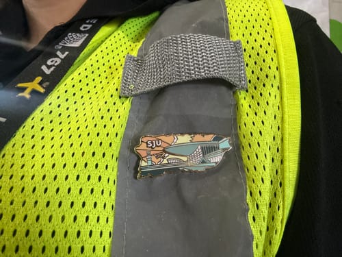 Customer photo review of Airport Enamel Pin | SJU - Puerto Rico