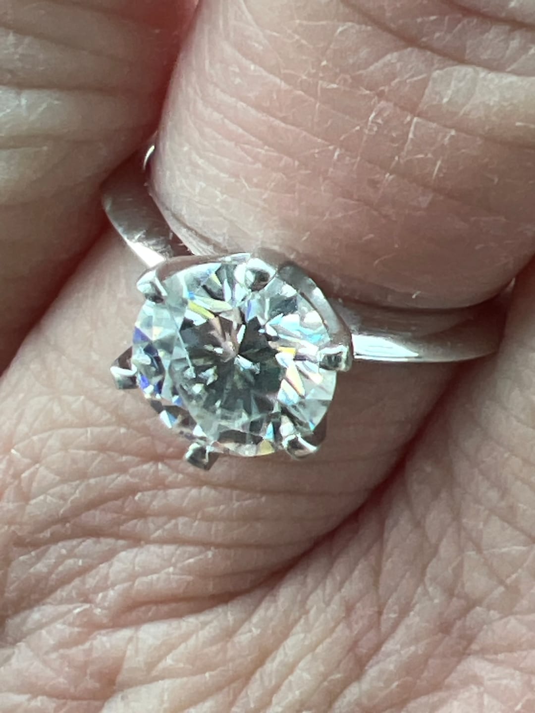 Customer photo review of Classic Solitaire Moissanite Six-Prong Sterling Silver Engagement Ring