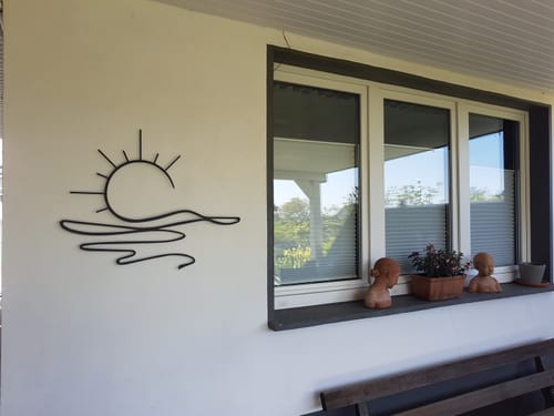 Customer photo review of Décoration Murale en Métal - Soleil (v03)