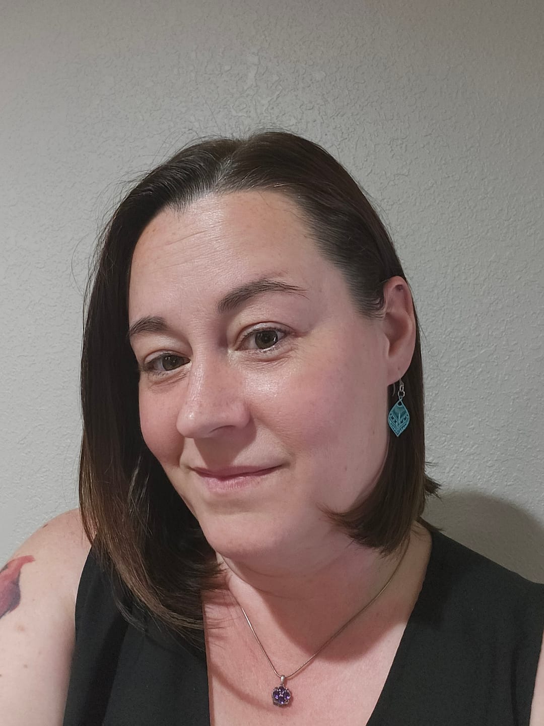 Customer photo review of Small Peacock Dangles Hypoallergenic Earrings for Sensitive Ears Made with Plastic Posts