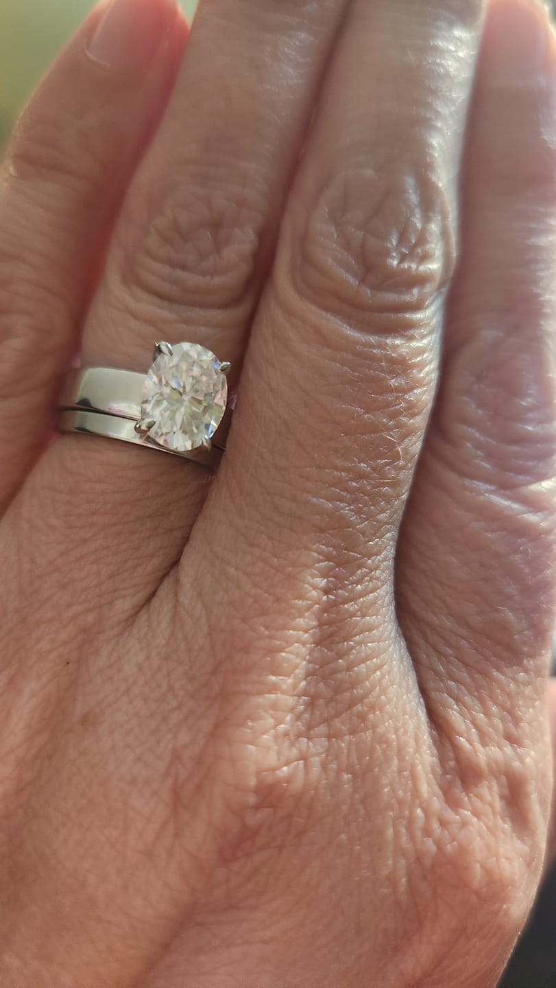 Customer photo review of Solitaire Oval Cut Moissanite Wide Band Engagement Ring