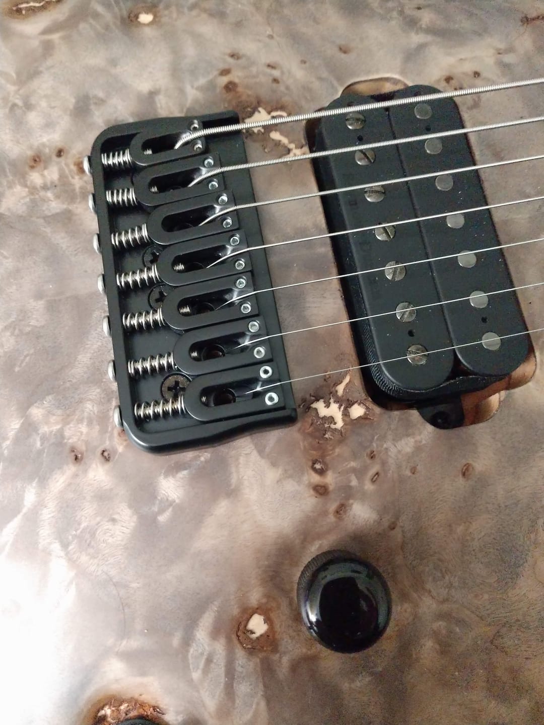 Customer photo review of Modern Stainless Steel Guitar Saddle (Sold Individually)