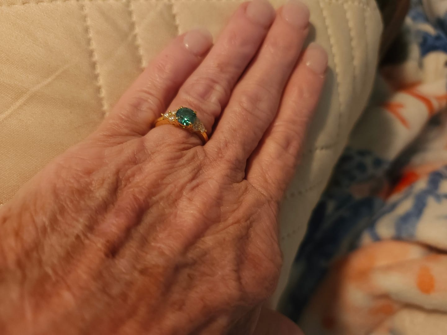 Customer photo review of Green Moissanite Side Stone Engagement Ring