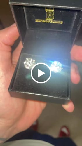 Customer video review of Moissanite VVS D Ideal Cut Stud Earrings in .925 Sterling Silver