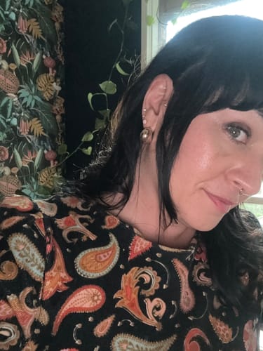 Customer photo review of Titanium Gold Flat Back Gem Body Jewellery. Labret, Monroe, Tragus and Cartilage Earrings.