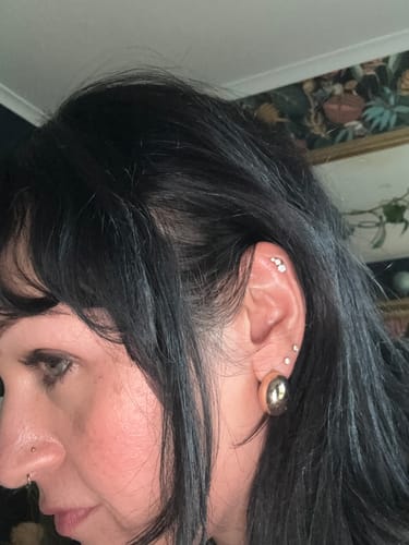 Customer photo review of Internally Threaded Gold Titanium Trio Body Jewellery. Labret, Monroe, Tragus and Cartilage Earrings.