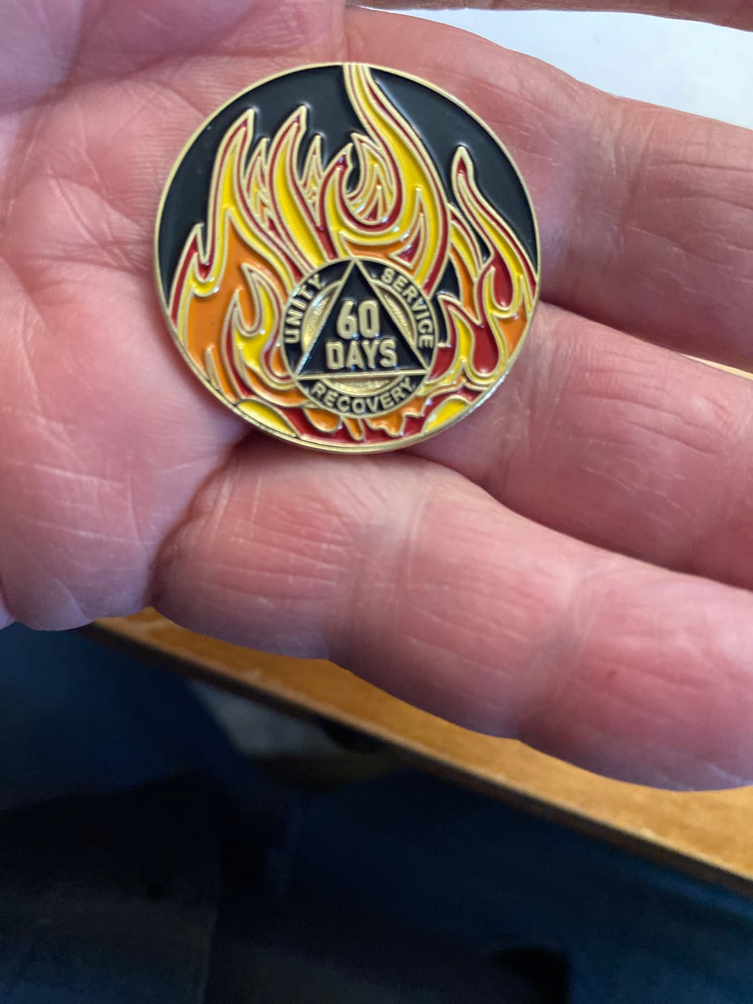 Customer photo review of 1 to 40 Year Sobriety Mint Twisted Flames Gold Plated AA Recovery Medallion/Chip/Coin - Black/Red/Orange/Yellow