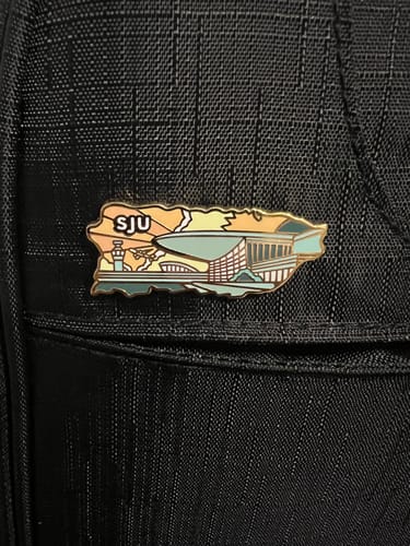 Customer photo review of Airport Enamel Pin | SJU - Puerto Rico