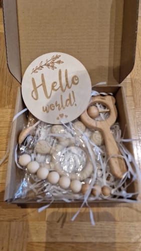 Customer photo review of Newborn Baby 4pc Silicone Hand Teether Wooden Bear Rattle Gift Set