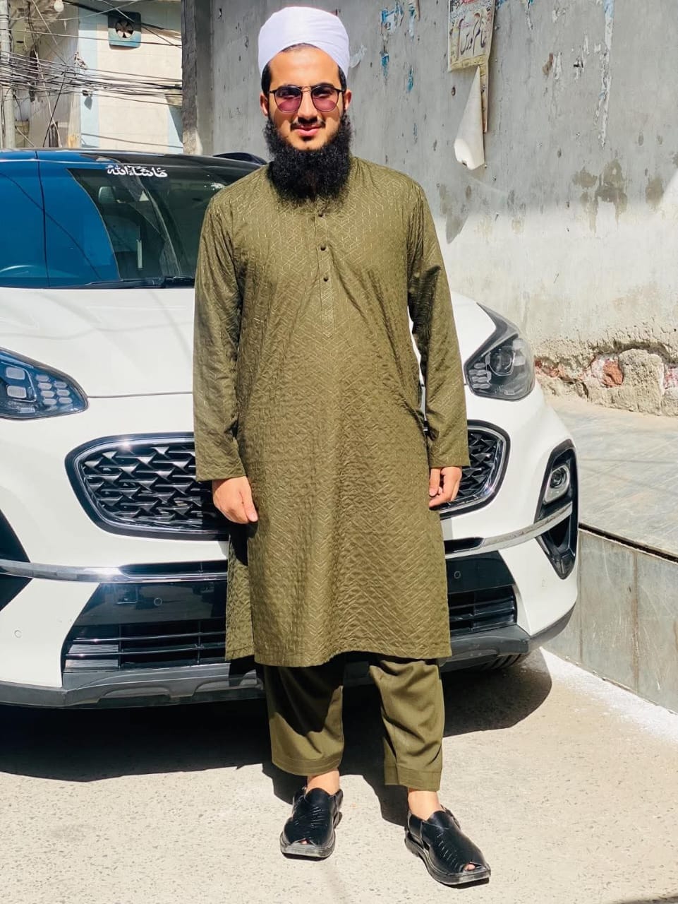 Customer photo review of Gents Unstitched wash n wear Embroidery Suit (nova crown)olive green