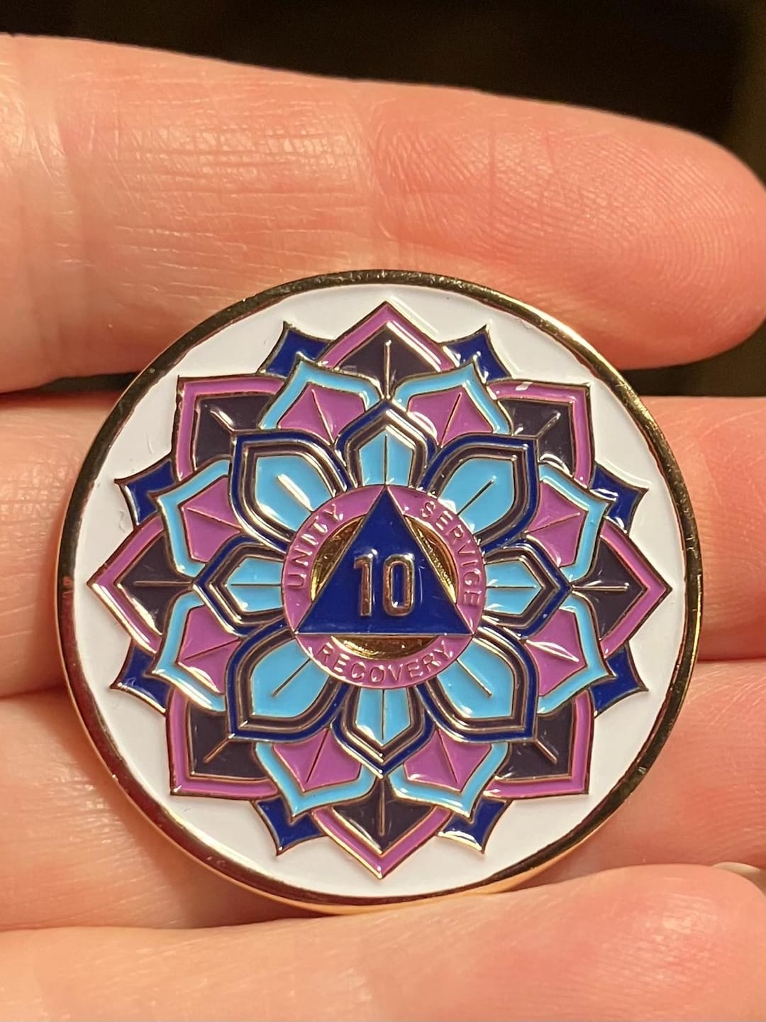 Customer photo review of 10 Year Sobriety Mint 'In Bloom' Lotus Flower Gold Plated AA Recovery Medallion - Ten Year Chip/Coin - White