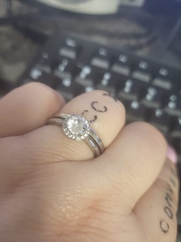 Customer photo review of Personalized Couple Halo Engagement Ring Stack