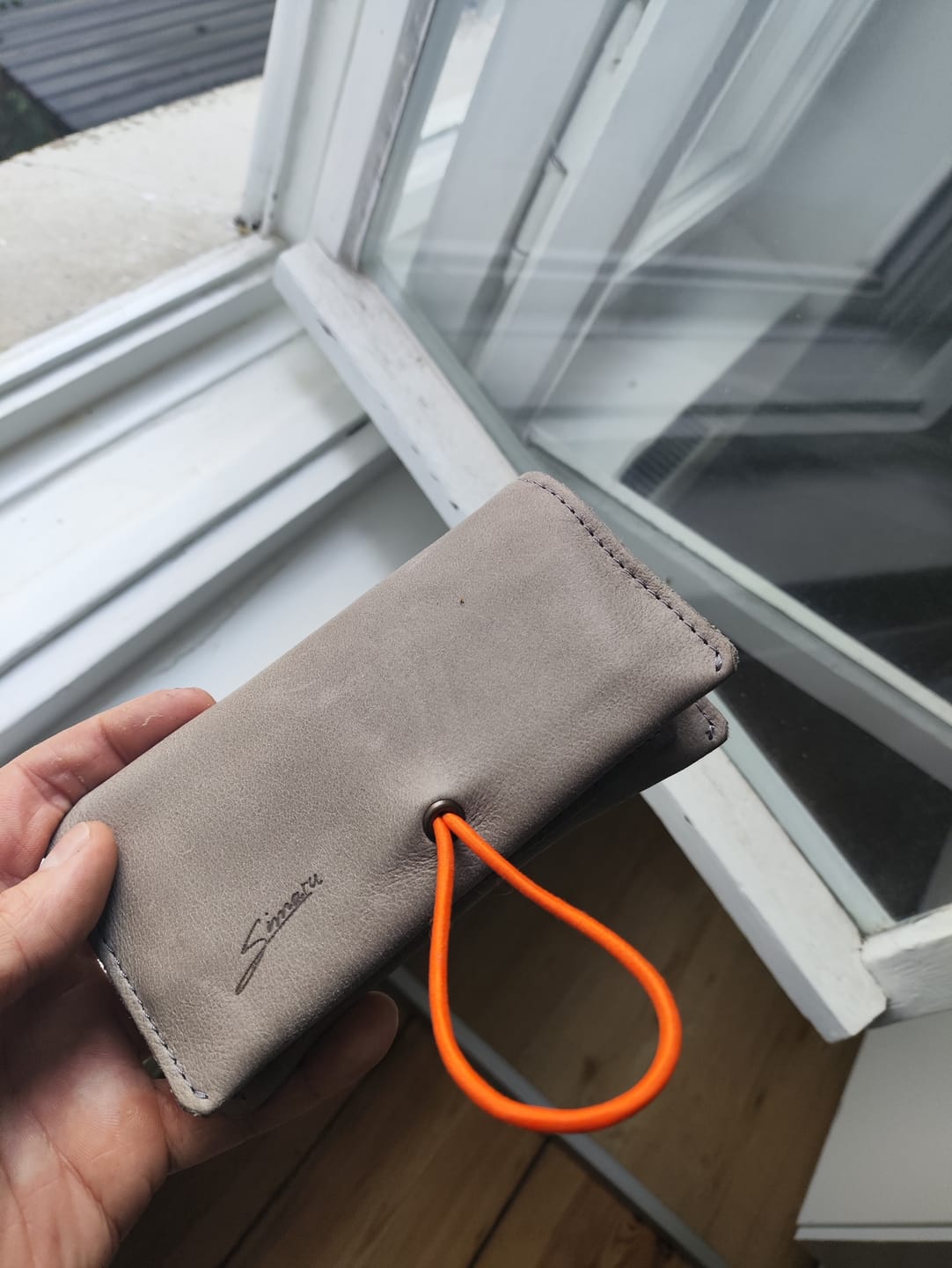 Customer photo review of Leder-Tabaktasche Sintra