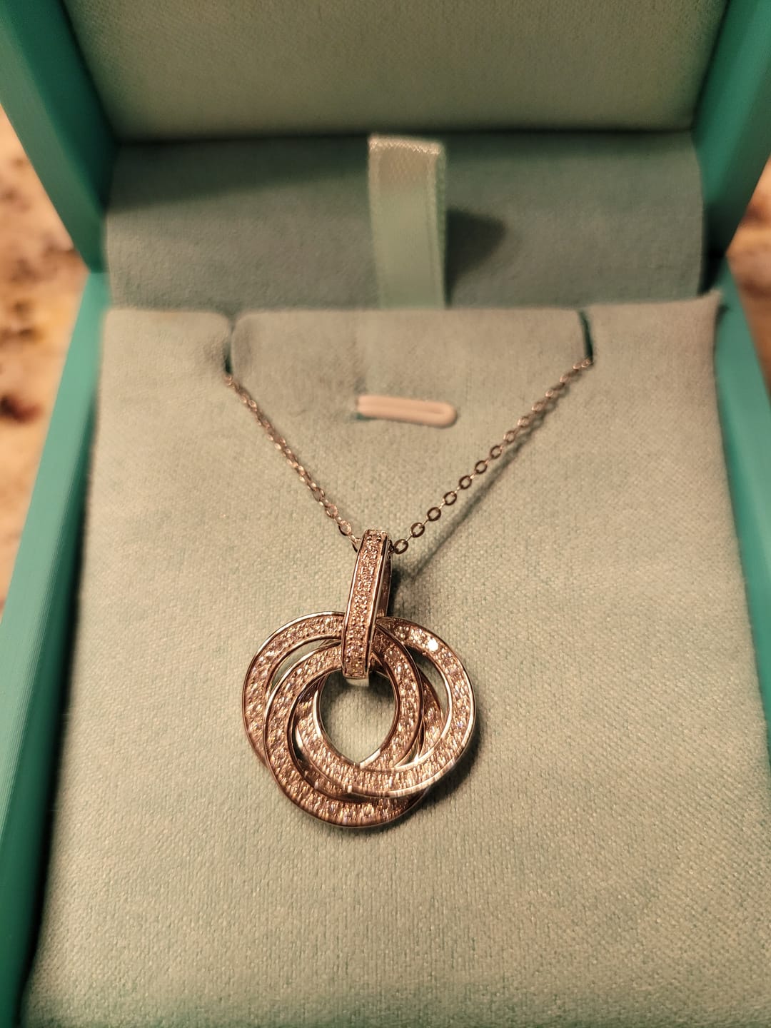 Customer photo review of Three Interlocking Circles Moissanite Pendant Necklace
