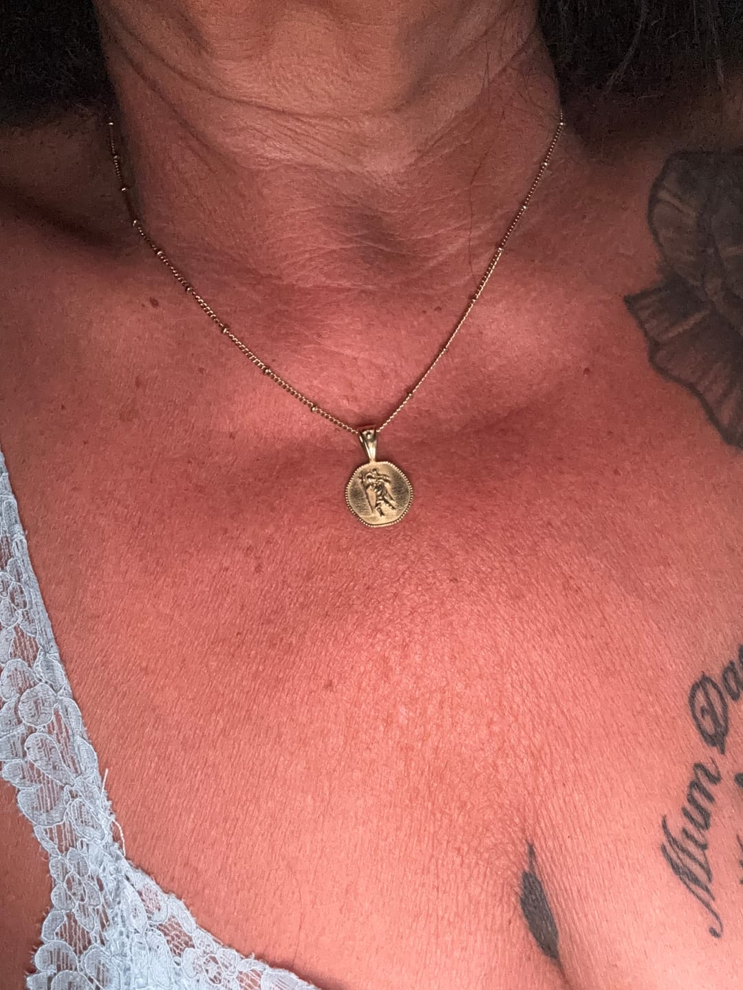 Customer photo review of St. Christopher Necklace - Stay Safe Wherever You Go