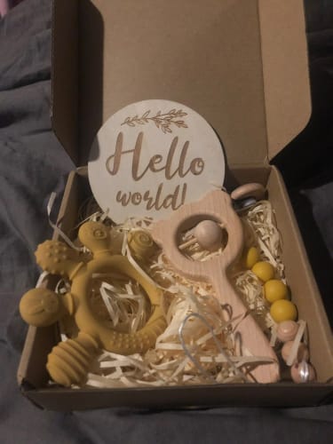 Customer photo review of Newborn Baby 4pc Silicone Hand Teether Wooden Bear Rattle Gift Set
