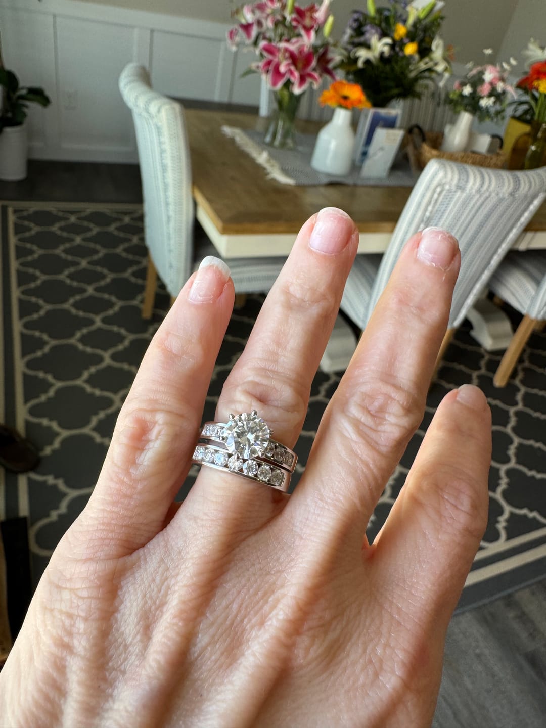 Customer photo review of Channel Set Moissanite Half Eternity Wedding Band Ring In Sterling Silver